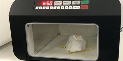 Analytik Jena's C3000 UV Crosslinker sterilizing N95 face mask