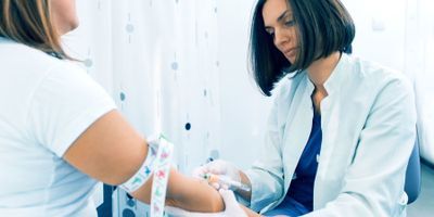 woman receiving blood test