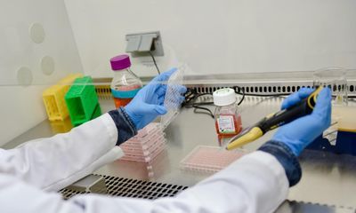 Researcher pipetting viruses