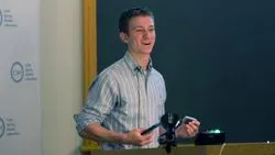 Aspyn Palatnick holds the world's first mobile genetics laboratory: an iPhone with the iGenomics DNA analysis app and Oxford Nanopore's MinION DNA sequencer 