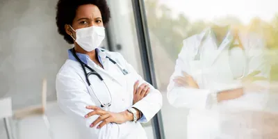 Female physicians wearing a surgical mask