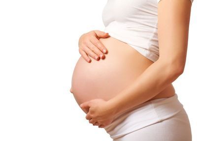 pregnant mother holding her belly