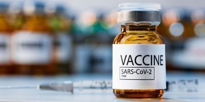 Photo of a vaccine vial labeled "SARS-CoV-2"