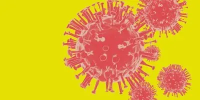 Illustration of sars-cov-2 virus colored red on a yellow background