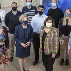 A group photo of scientists from UC Davis and Maurice J. Gallagher, Jr.,