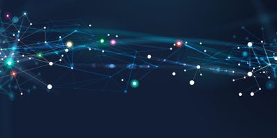 Abstract photo of glowing dots on a dark background