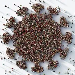 Aerial view of a group of people standing on a white background in the shape of the coronavirus