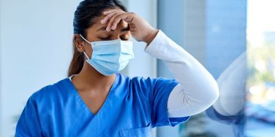 A primary care physician suffering exhaustion and burnout