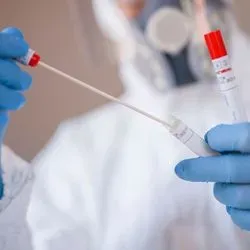 Researcher collecting smaples for PCR coronavirus test