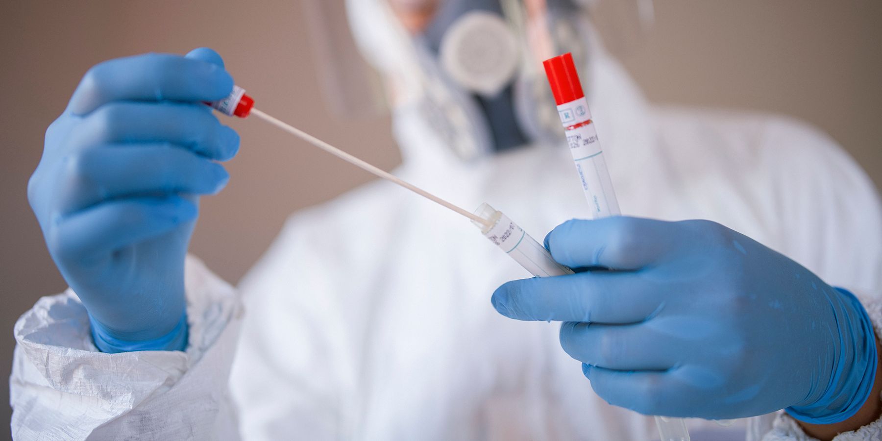 Researcher collecting smaples for PCR coronavirus test