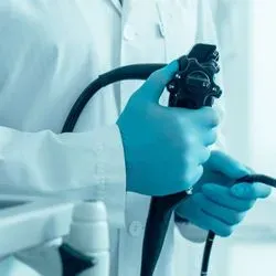 Doctor holding endoscpoe