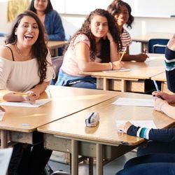 Photo of students sitting at desks in a classroom