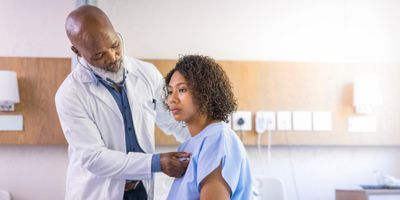 Doctor screening a patient