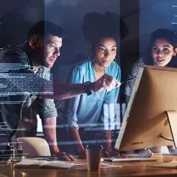 Researchers working on a computer
