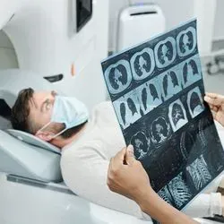 Medical professional looking at an MRI scan