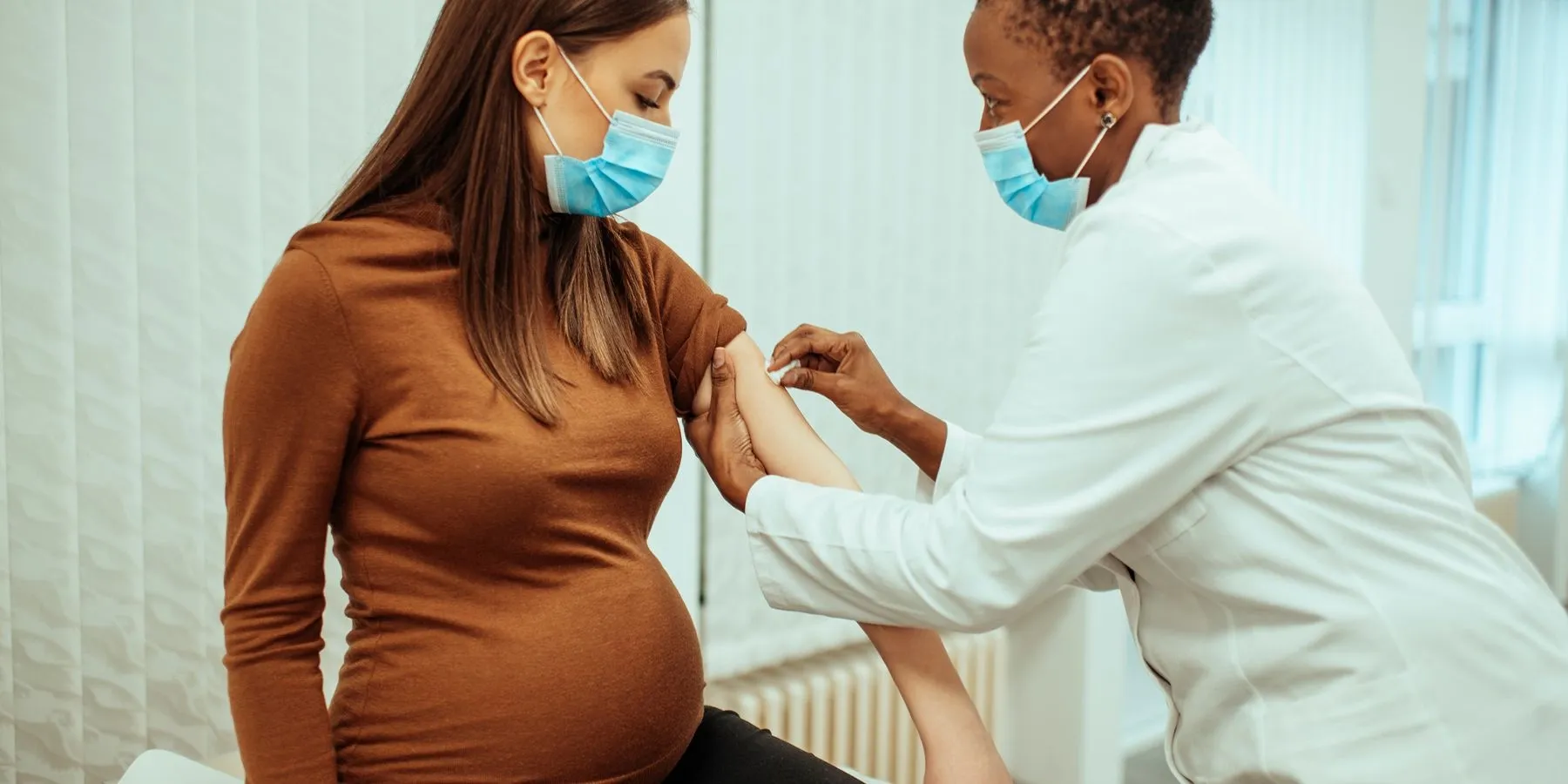 Image of woman getting vaccinated