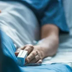Patient in hospital bed