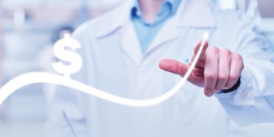 Photo of a lab professional next to a diagram showing increase earnings