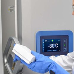 Lab professional removing samples from a freezer