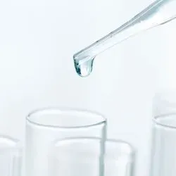 Photo of Milli-Q water being pipetted into a clinical lab sample