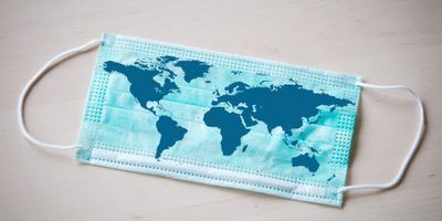 A surgery mask with a map of the globe on it