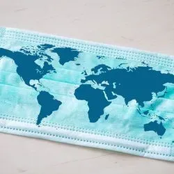 A surgery mask with a map of the globe on it