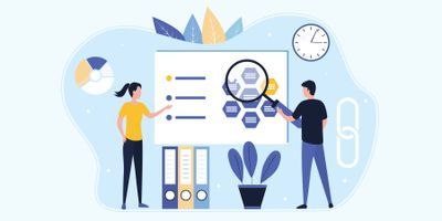 Clinical lab professionals looking at a graph in the lab