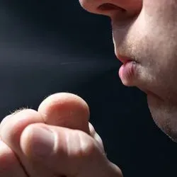 Man coughing