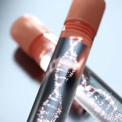 Two testubes with graphics of DNA in them
