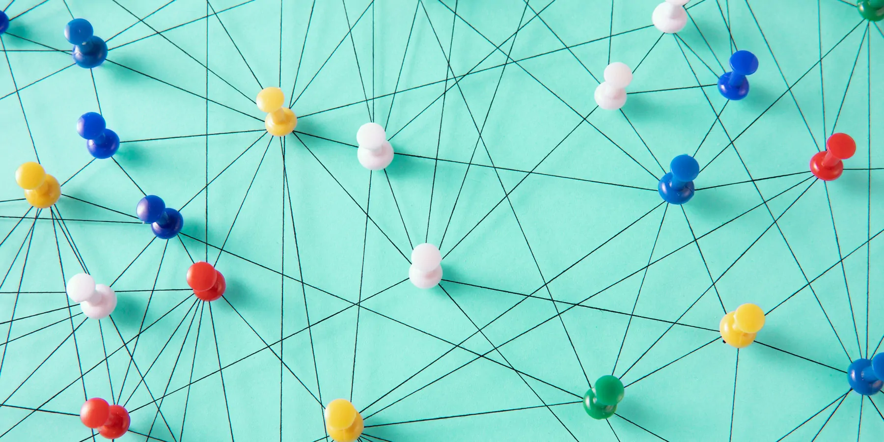 Illustration of thumb tacks linked together with string into an interconnected network