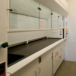 Empty fume hoods in a lab