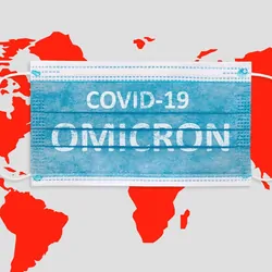 A face mask with the words COVID-19 Omicron written on it, that is on a backdrop of the world with the continents painted red