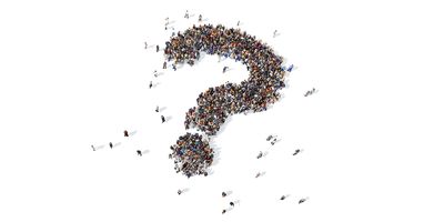 People grouping together to form a question mark