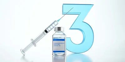 A vaccine bottle with a syringe and the number 3