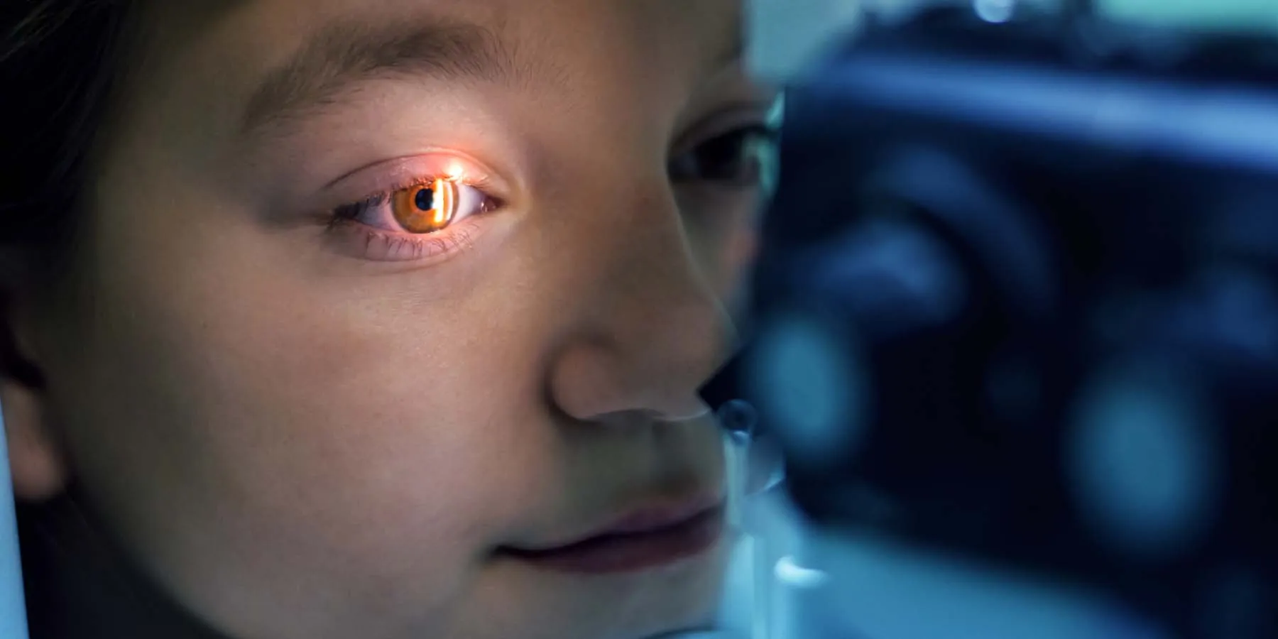 Young girl getting an eye exam