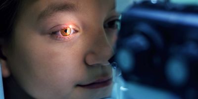 Young girl getting an eye exam