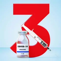 A number 3 behind a needle and a bottle of COVID-19 vaccine