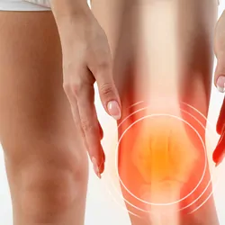 Women with knee pain on a white backdrop