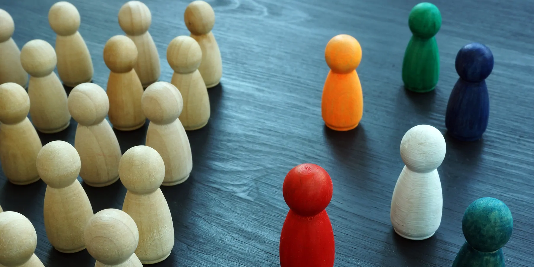 Wooden pegs seperated into the same color on the left side, and different colors on the right