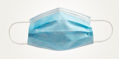 Surgical face mask on a white background