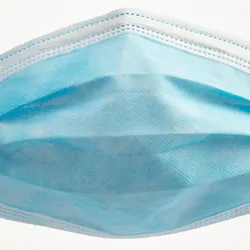 Surgical face mask on a white background