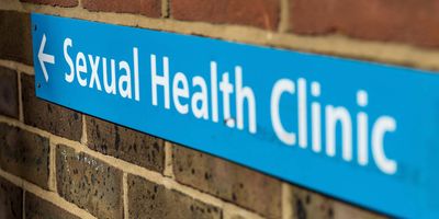 Photograph of a sign that reads "Sexual Health Clinic"