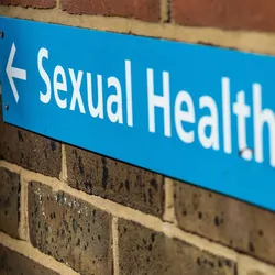 Photograph of a sign that reads "Sexual Health Clinic"
