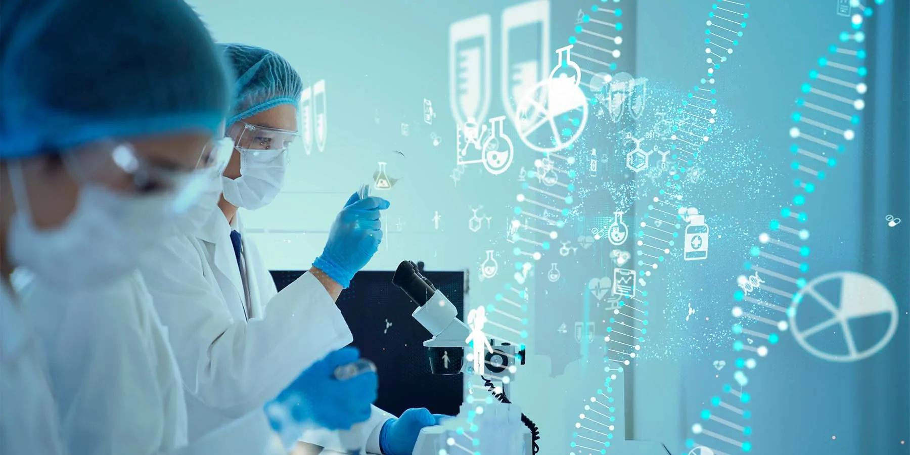 Researchers in PPE in front of microscopes working