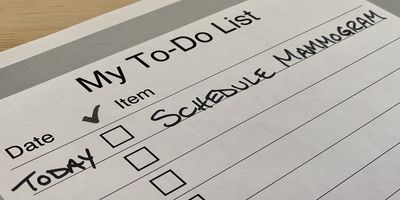 A to-do list with "schedule mammogram" written on it