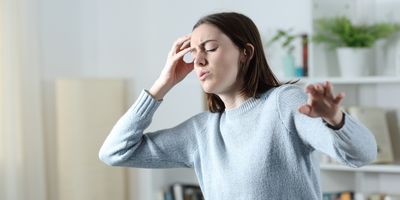 Women experiencing dizziness 