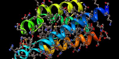 Graphic model of metabolites and proteins on black background