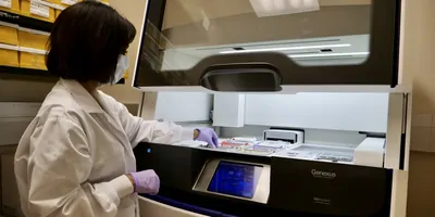 Photo of a technologist using the Genexus System at Courtesy of William Osler Health System.