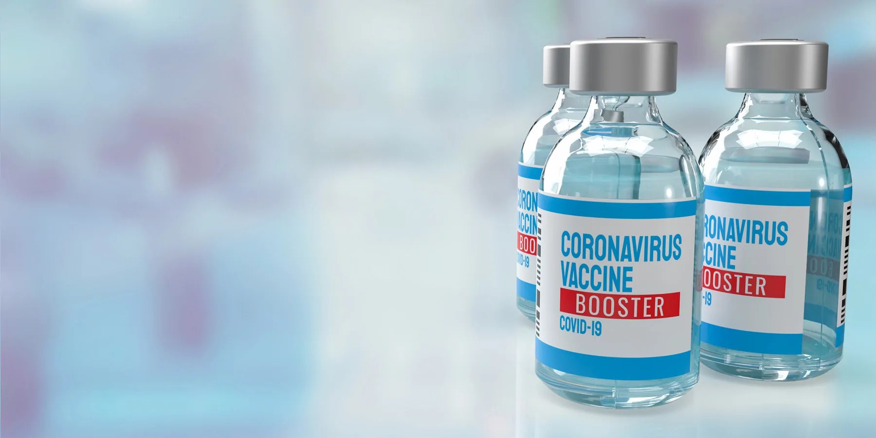 Three bottles of the COVID-19 vaccine booster