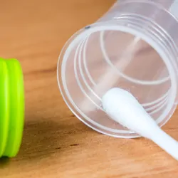 Tube and cotton swab for collecting saliva
